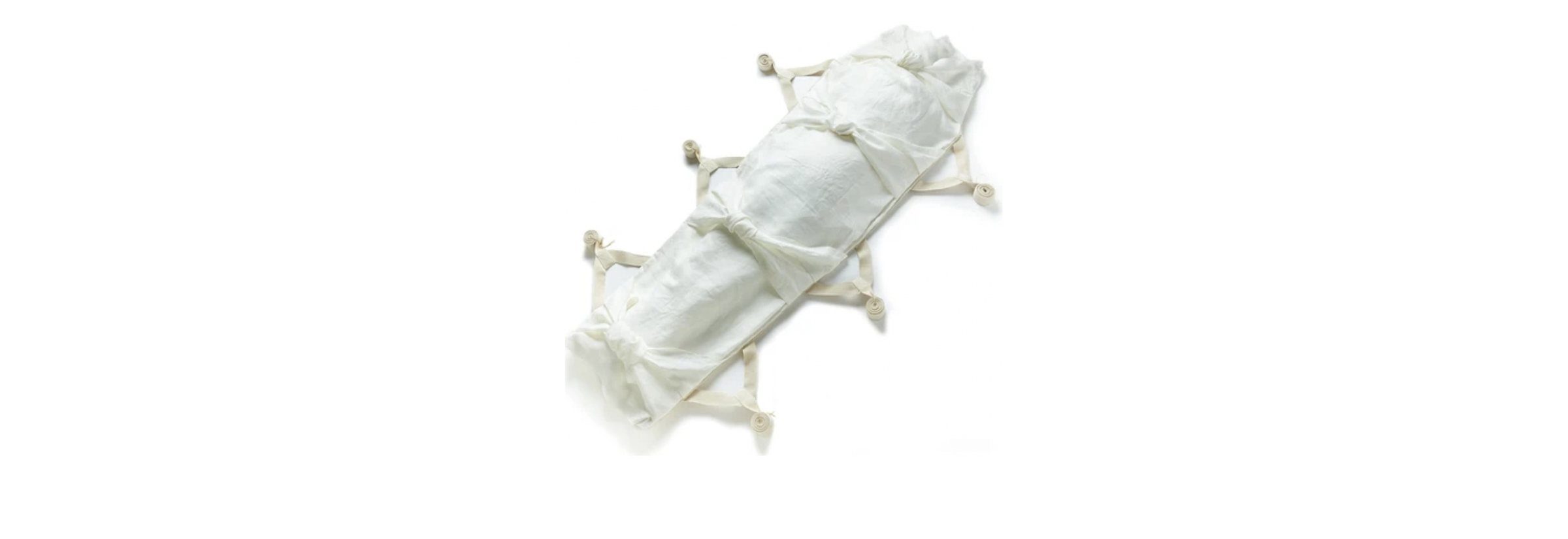 Pure Light burial shroud, a white natural-fiber cloth with lowering straps